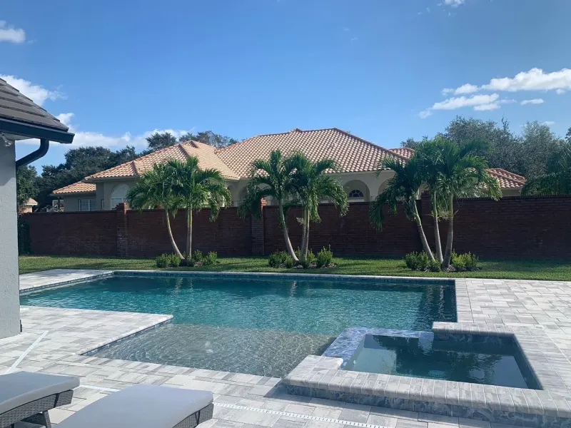 Signature sun shelf detail in a custom pool — Next Level Pools and Spas 12